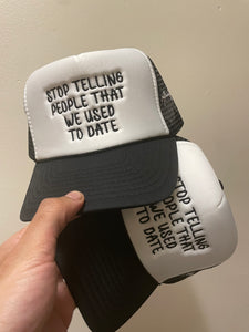 "We Never Dated" Trucker Hat (Multiple Colors)